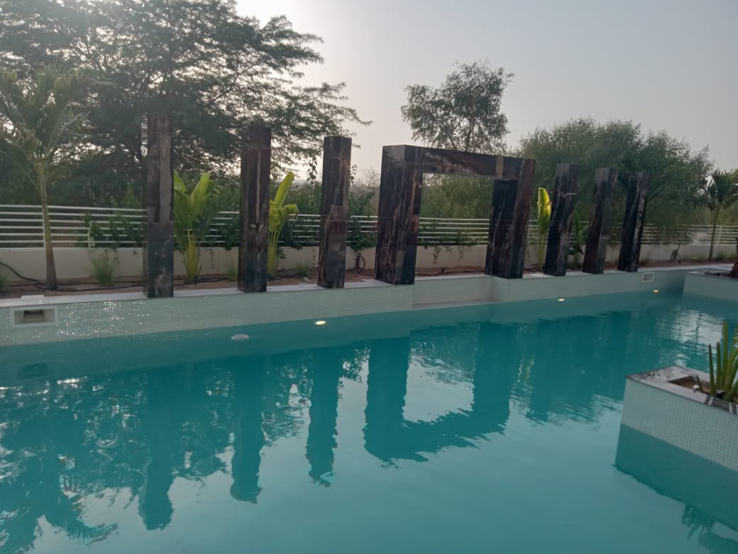 Swimming Pool Deep Tile Cleaning & Vacuuming by Wajid Ali Landscap and swimming pool